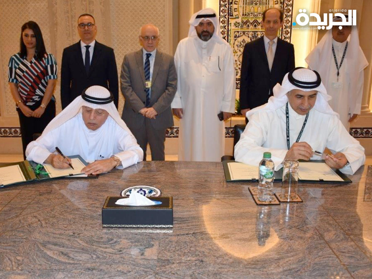 بدر مال الله وبدر السعد أثناء التوقيع