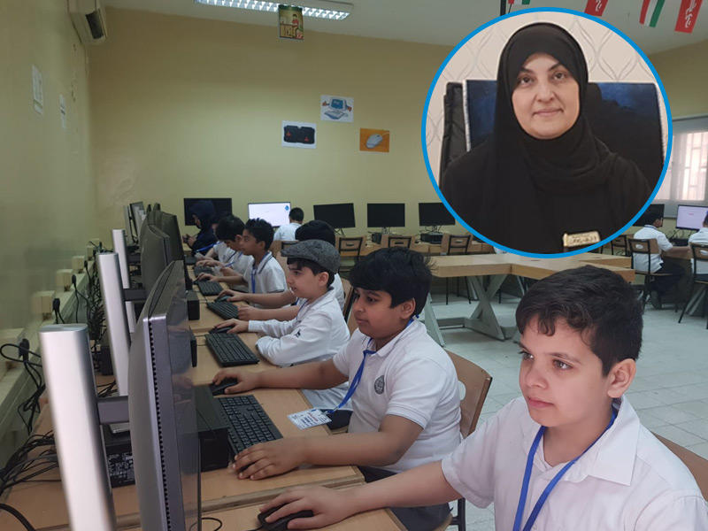 جانب من الاختبارات في مدرسة زيد بن الخطاب الابتدائية بنين و في الإطار مديرة المدرسة انتصار الأحمد n