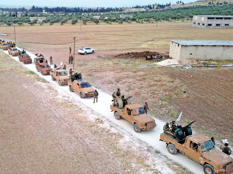 مقاتلون موالون لتركيا في شمال سورية  (أ ف ب)