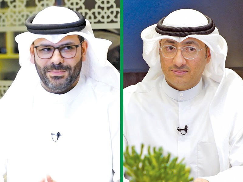 المحامي د. حسين العبدالله وأستاذ القانون التجاري في كلية الحقوق د. محمد رباح المطيري