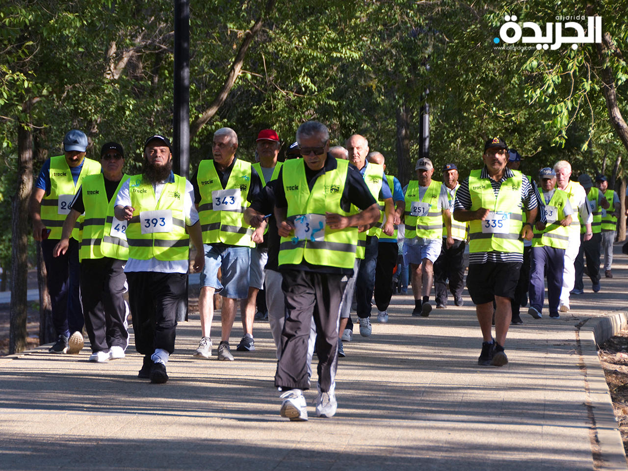 كبار سن يشاركون في السباق في حديقة الملك حسين في عمان