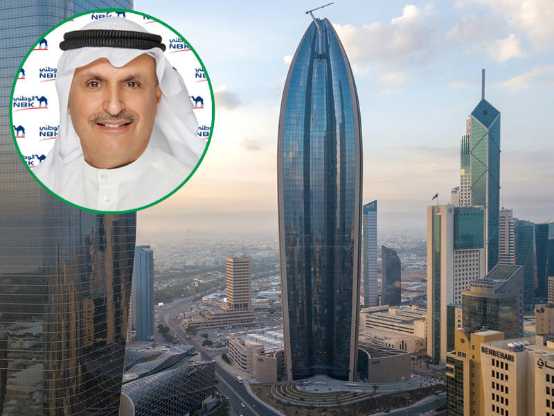 مبني بنك الكويت الوطني و في الاطار نائب رئيس مجلس الإدارة والرئيس التنفيذي لمجموعة البنك عصام جاسم الصقر