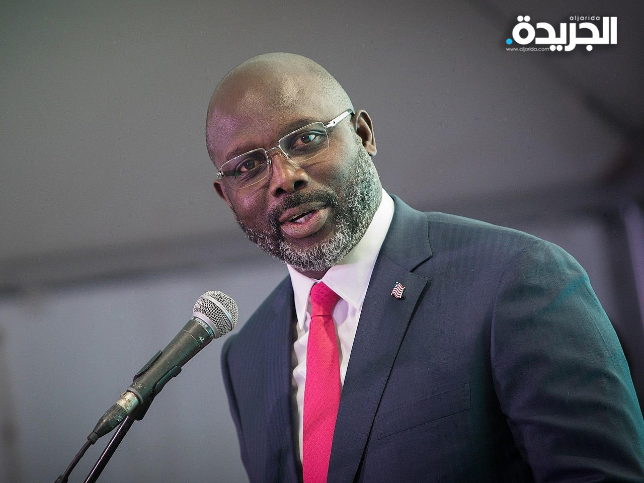 لاعب نادي ميلان السابق والرئيس الليبيري جورج وياه