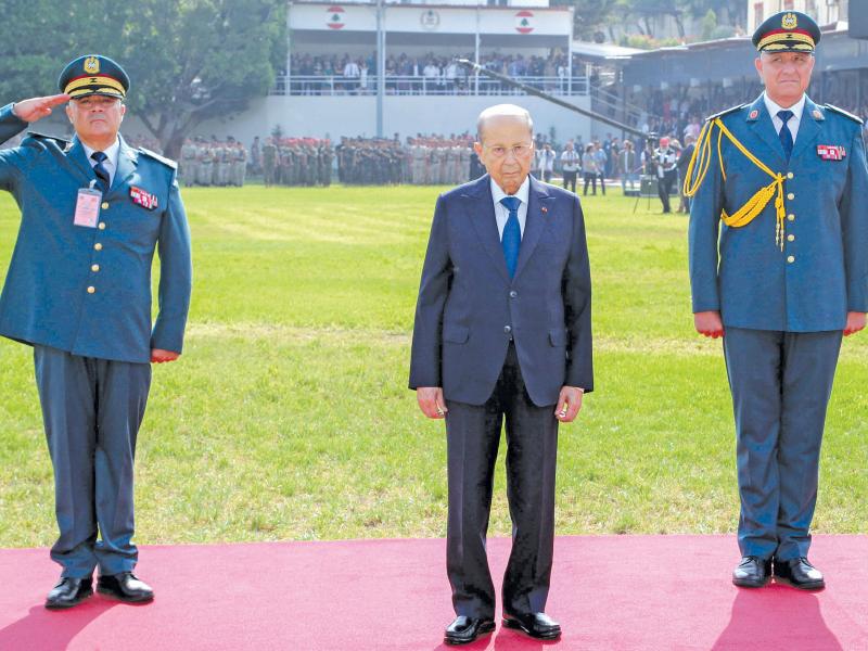 عون في احتفال عيد الجيش بالفياضية (أ ف ب)