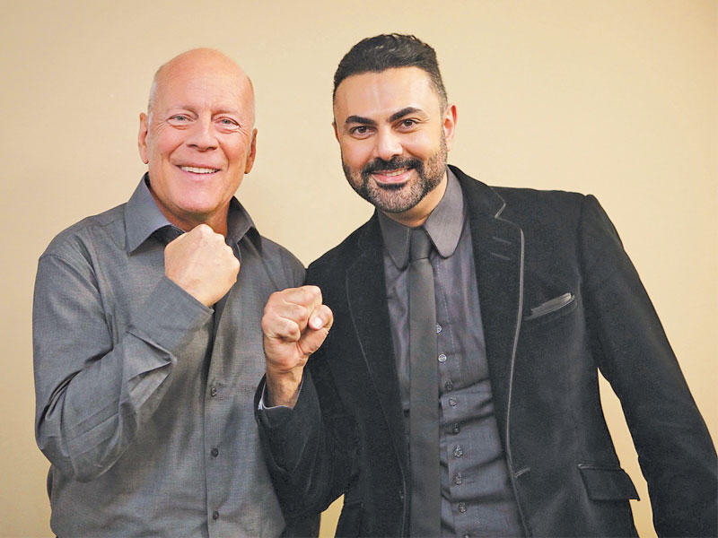 الفنان محمد كريم  مع النجم العالمي بروس ويليس