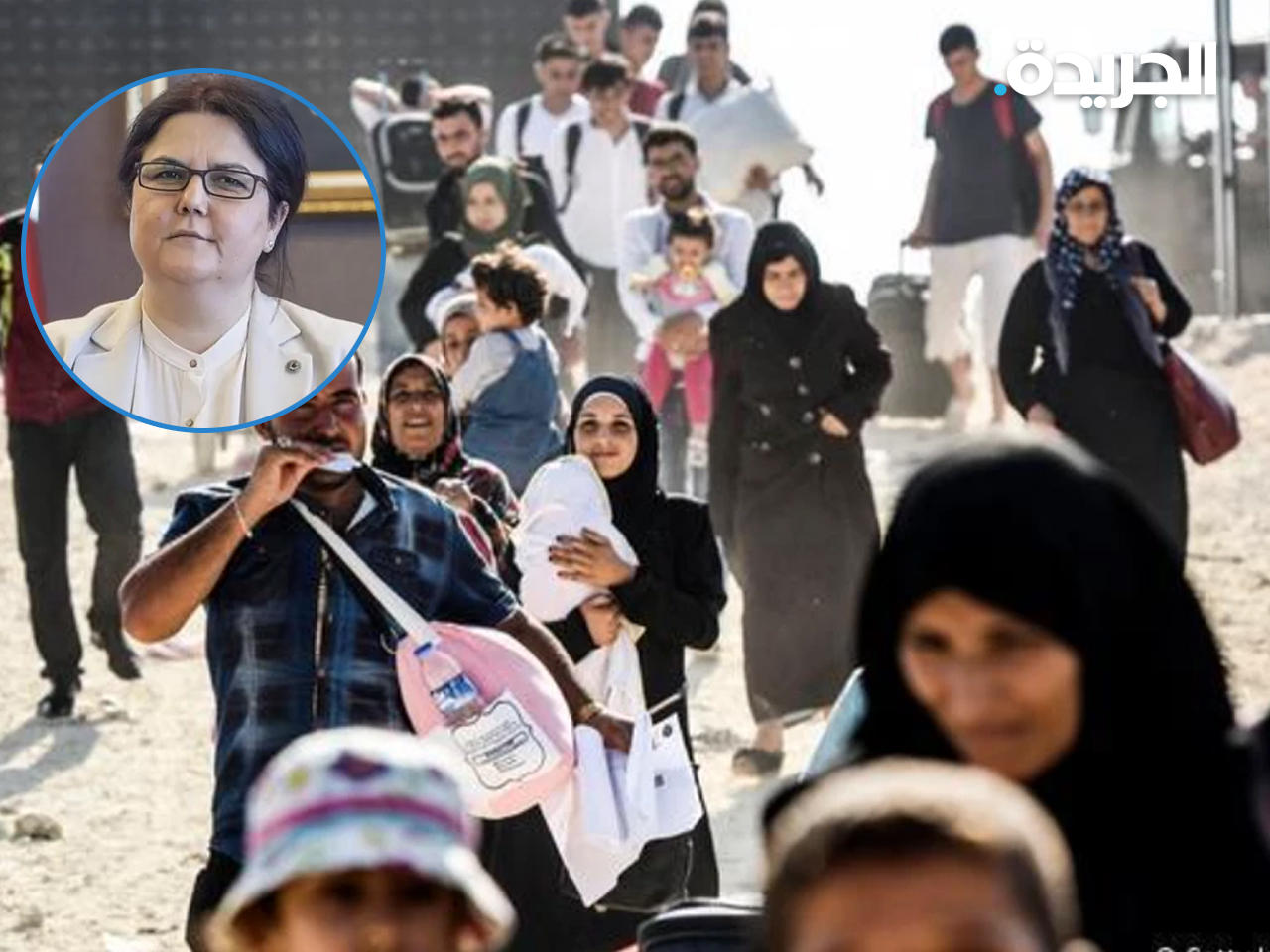 داريا يانيك وفي الاطار لاجئون سوريون