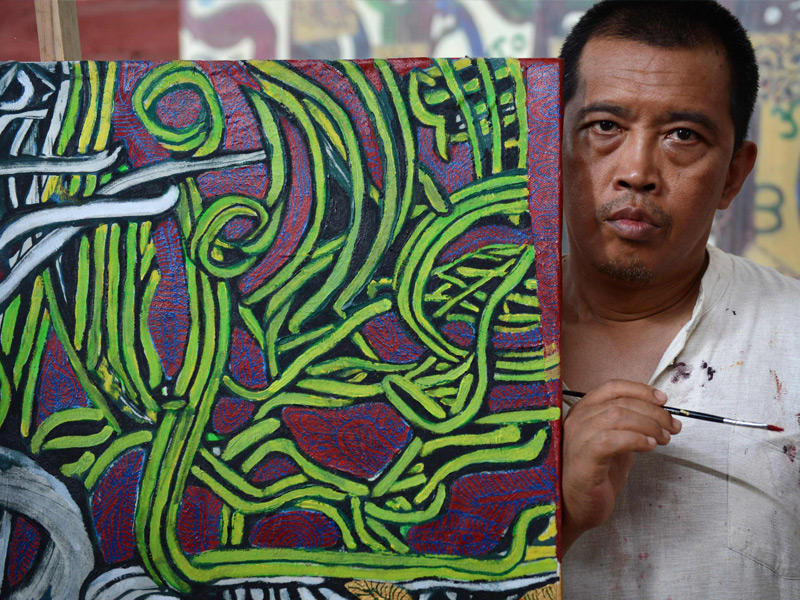  فنان من ميانمار وسجين سياسي سابق هتين لين