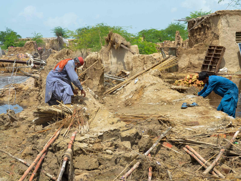 منازل جرفتها الفيضانات في بلوشستان  (ا ف ب)