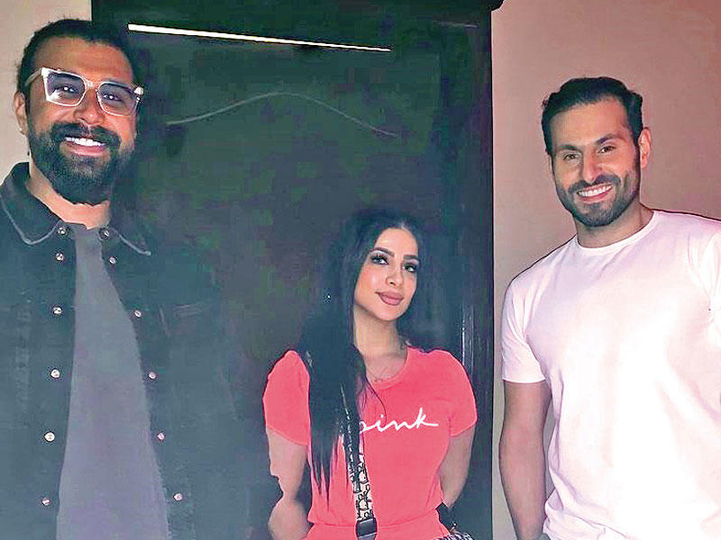 الكاتبة فاطمة العام وعلي كاكولي وفؤاد عليn