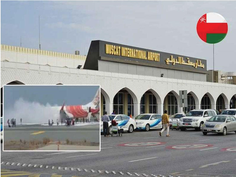مطار مسقط الدولي وفي الاطار الطائرة المحترقة 