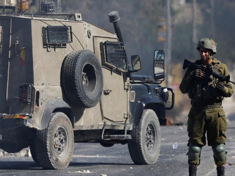 احد عناصر القوات المحتلة