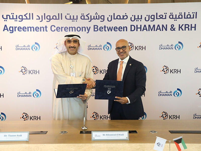 ثامر عرب ومحمد المعيلي خلال توقيع الاتفاقية