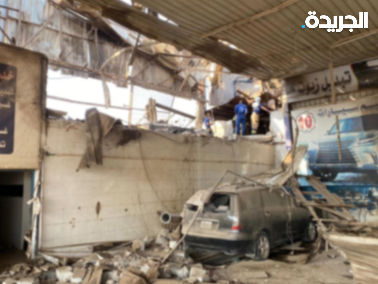 آثار الانفجار في محطة غسيل السيارات بمنطقة الفحيحيل الصناعية